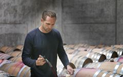 Domaine Roy et Fils Winemaker Jared Etzel in the Cellar Winery Image